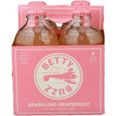 two bottles of beety sparkling grapefruit are in a pink cardboard box