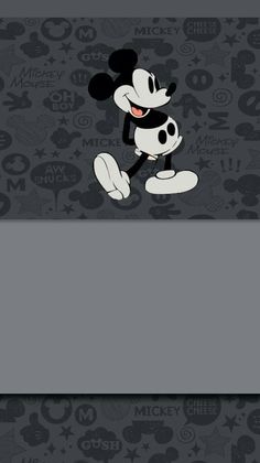 the mickey mouse wallpaper is in grey and black with white lettering on it, which reads