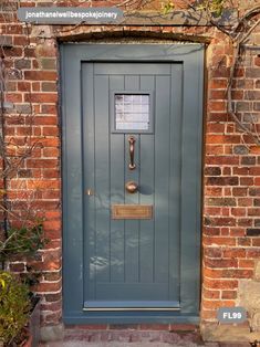 a blue front door to a brick building