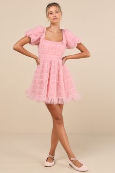 Flirt your way through all the cutest events in the Lulus Utterly Adored Pink Tulle Textured Puff Sleeve Bow Mini Dress! Dreamy tulle boasts a cloud-like textured effect (with contrasting white stitching) as it shapes short puff sleeves with elastic at the cuffs. Square neckline tops a princess-seamed bodice with a single tie at the back and a fitted waist. Skirt has a flaring silhouette that ends at a ruffled mini hem. Darling bow details throughout lend a coquette finish. Hidden zipper/clasp at back. Fit: This garment fits true to size. Length: Mid-thigh. Size medium measures 33" from shoulder to hem. Bust: Great for any cup size. Waist: Fitted - very fitted at natural waist. Hip: Not Fitted - fuller skirt allows room for hips. Undergarments: May be worn with a strapless bra, adhesive br Tulle Texture, Bow Mini Dress, Puff Sleeve Mini Dress, Puff Dress, Pink Tulle, Strapless Bra, Mini Dress With Sleeves, Full Skirt, Square Neckline