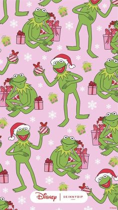 the frog is holding a present while wearing a santa claus hat and sitting on a pink background with snowflakes