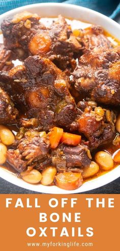 traditional oxtail stew with beans and carrots in a white bowl