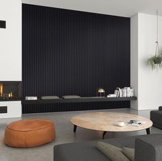 a modern living room with wood slats on the wall and fireplace in the corner