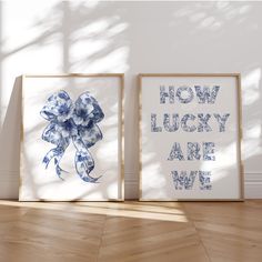 two blue and white framed pictures with the words how lucky are we