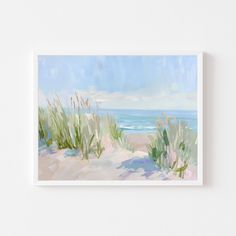 an abstract painting of grass and the ocean in pastel colors on a white wall