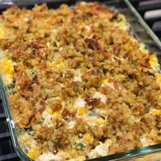 a casserole dish filled with corn and meat