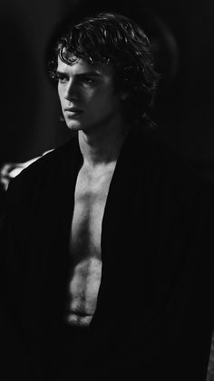 black and white photograph of a shirtless man