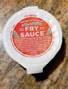 a close up of a sauce on a counter top with the words jalapeno fry sauce