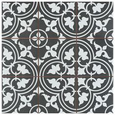 black and white tile with an intricate design on the bottom, which is also available in different colors