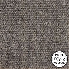 a close up view of the texture of a carpet with a white circle on it