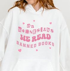 The cutest and coziest way to support literary freedom, while referencing one of your favourite movies! A perfect gift for English teachers, librarians, bookworms, book clubs, writers, and you! Made with a thick blend of cotton and polyester, it feels plush, soft and warm. In the front, the spacious pocket adds extra practicality and coziness. ⭐️ SIZING ⭐️ Sizes are unisex and regular fit. Runs true to size. Please find exact measurements in size chart in product photos. For a fitted look, go wi Banned Books Shirt, Read Banned Books, English Teacher Gifts, Books Shirt, English Teachers, Banned Books, Book Shirts, English Teacher, Librarian