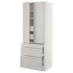 a tall white cabinet with two doors and drawers on the bottom, next to a smaller one