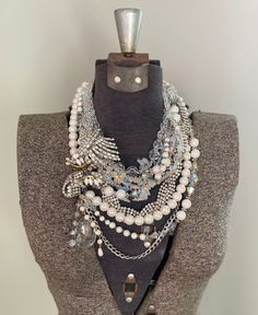 * This is a CUSTOM ORDER, please allow 2-3 weeks for creation! I will be in contact with you the entire time as you choose what specialized rhinestone pieces you want in your unique statement piece made just for you. * How stunning is this ivory white pearl and crystal necklace?!  There are a ton of sparkles in this lovely ensemble!  Repurposed rhinestone pieces dating from the 1940s-60s are used throughout the piece to give it a unique sparkle unlike rhinestone pieces created today.  The vintag Wedding Necklaces With Rhinestones, Opulent Silver Crystal Jewelry, Costume Jewelry Necklace With Bling, Opulent Silver Jeweled Jewelry, White Rhinestone Necklace With Bling Style, Unique Party Jewelry With Bling, Gift Jeweled Necklaces, Bling Jewels Necklace For Gift, Evening Diamond Jeweled Necklaces