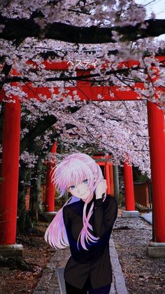 a woman with long pink hair standing in front of red pillars