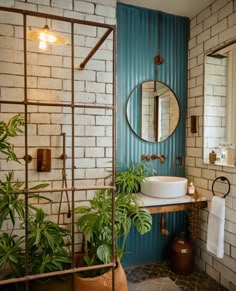 a bathroom with brick walls and green plants