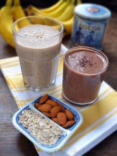 two smoothies, one with almonds and the other with oatmeal