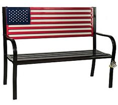 a bench with an american flag painted on it's back and arms, sitting in front of a white background