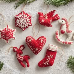 christmas ornaments are arranged on a table