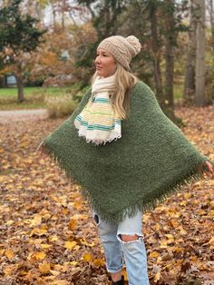 BoBo Hand Knit Baby Alpaca Fringe Poncho- Yosemite An ultra chic poncho for any season made out of the most sustainable wool on the planet. Baby Alpaca is the softest! This poncho is hand knit from baby Alpaca yarn by our artisans in Peru, only natural dyes are used here. A BoBo GloBal Design produced in collaboration with our artisan partner in Cusco, Peru. A traditional poncho silhouette with a fringe detail along the hem. A perfect layering piece to style over jeans, leggings, a dress, or a s Alpaca Poncho, Cusco Peru, Fringed Poncho, Alpaca Fiber, Alpaca Yarn, Jeans Leggings, Global Design, Baby Alpaca, Alpaca Wool