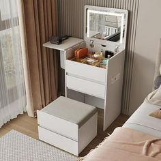 a bedroom with a bed, dresser and mirror on it's side table in front of a window