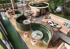 an aerial view of a restaurant with tables, chairs and couches on the ground