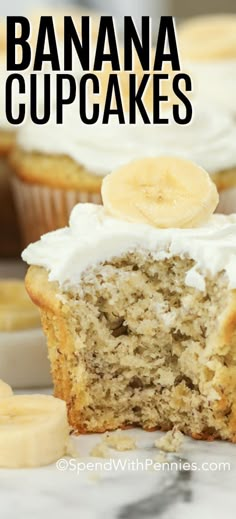 there is a banana cupcake with white frosting and sliced bananas on the side