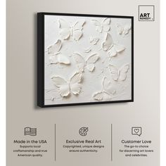 an advertisement for the art gallery featuring white butterflies on a gray background with text that reads, made in the usa exclusively real art