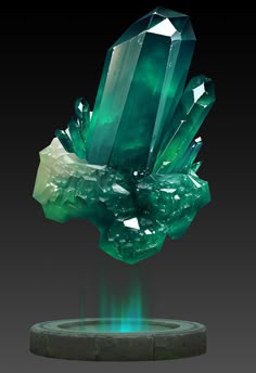 a green crystal sculpture sitting on top of a table