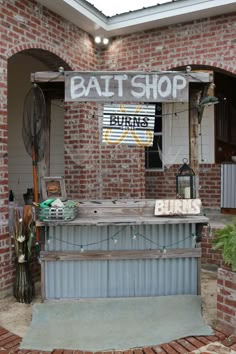 a brick building with a sign that says bat shop