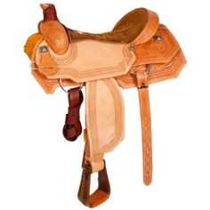 a saddled horse with brown and tan accents