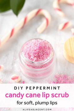 DIY Peppermint Candy Cane Lip Scrub. Learn how to make a pretty pink DIY lip scrub in a delicious peppermint candy cane flavour! This plumping lip scrub recipe is perfect for Christmas and the holiday season. It’s made with simple, natural ingredients like sugar and coconut oil, with beet powder for colour. Includes vanilla and peppermint essential oils for a festive candy cane fragrance. #lipscrub #alifeadjacent #sugarscrub