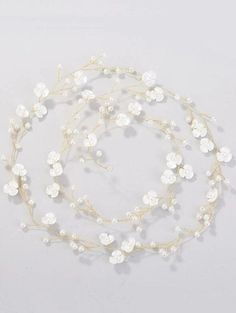 This beautiful accessory is a bridal pearl and hand-wired hair vine. Wedding flower head wreath long hair vine.Inspired by elegant myth creatures of feminine fairies, this delicate hand-crafted hair vine accessory adds glamour and chic to your bridal outfit.At nearly 40 inches in length, there are many ways to wear this beautiful hair vine. The extra flexible wire can be easily bent according to your desired style. You can wear it as a head wreath, as a headband, or wrap it around your braid, po Myth Creatures, Pearl Hair Vine Wedding, Long Hair Vine, Flower Head Wreaths, Pearl Bridesmaid Jewelry, Gold Hair Vine, Hair Garland, Beach Jewelry Boho, Pearl Hair Vine