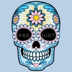 a women's blue t - shirt with a colorful sugar skull on the front