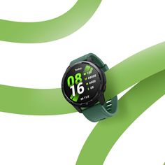 a smart watch with the time displayed on it's face and green strap around its wrist