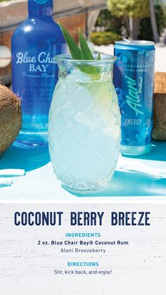 an advertisement for a blue bottle company with coconuts and a drink in the background