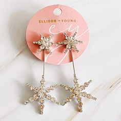 Infuse any outfit with a touch of elegance with our Double Starburst Statement Earrings. These stunning earrings feature a beautiful, sparkly starburst design that is sure to make a statement. Perfect for special occasions, these earrings will elevate your look and add a touch of glamour to any outfit. Dimensions: approximately 1.5” x 3” 18k gold plated Brass, glass stones Lead and Nickel Free Made in China Starburst Design, Boys Casual Shoes, Hair Setting, Air Max Women, Brass Glass, Stunning Earrings, Elevate Your Look, Scrunchie Hairstyles