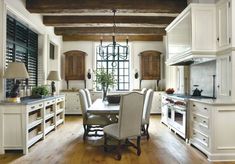 an image of a dining room and kitchen