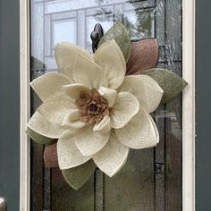 a large white flower on the front door