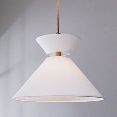 a white light hanging from a ceiling fixture