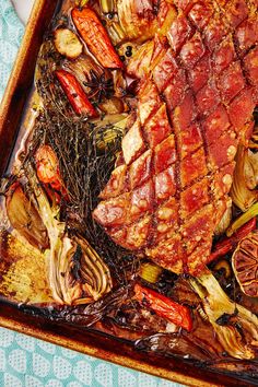 meat and vegetables on a serving tray ready to be eaten