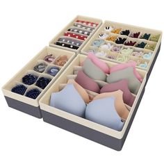 an open drawer filled with different types of bras