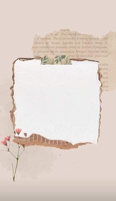 an old torn piece of paper with flowers on it