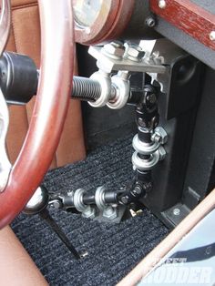 the inside of a car with an automatic gear box and steering wheel in it's center console