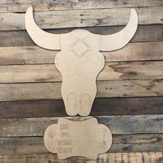 paper cut out of a cow's head with the words date, time, height and length