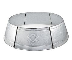 a silver metal bowl with snowflakes on it