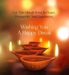 happy diwali greeting card with lit candles in the background and an image of three bowls