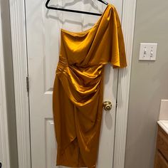 Gold One Shoulder Dress Size Small Stunning On! New With Tags Bought From Local Boutique Gold One Shoulder Dress, Champagne Satin Dress, Coral Mini Dress, Dresses Gold, Black Sequin Mini Dress, White Strapless Dress, White Sleeveless Dress, Statement Dress, Check Dress