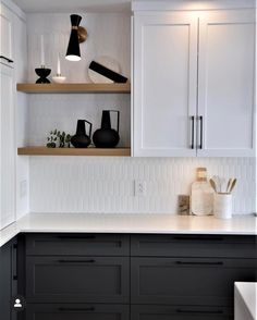 black and white kitchen with open shelving