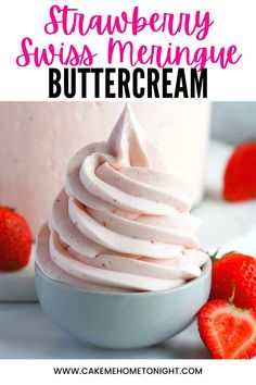 strawberry swiss meringue buttercream in a bowl with strawberries on the side