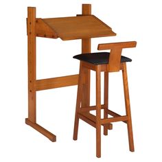 a wooden desk with two stools next to it